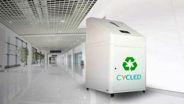 Ny avfallscontainer som reduserer miljøpåvirkningen  med Cycled-navnet påskrevet 